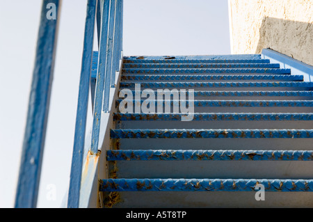 Detail of some old weathered and rusting steel stairs. Great textures. Space for  copy. Camera: Nikon D2x. Stock Photo