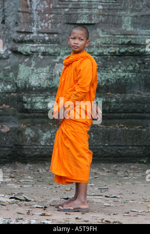 Buddhist monk in Ta Prohm Temple in the Angkor Area near Siem Reap, Cambodia Stock Photo