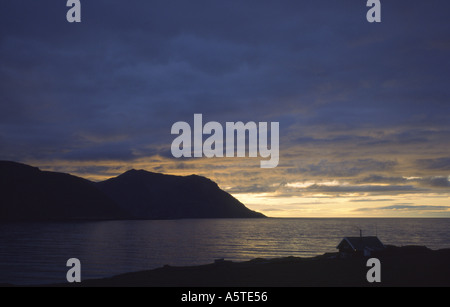 Midgnight Sun Over Icelandic Fjord Stock Photo