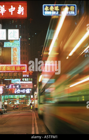 Trams and traffic at night on Hennessy Raod in Causeway Bay Hong Kong