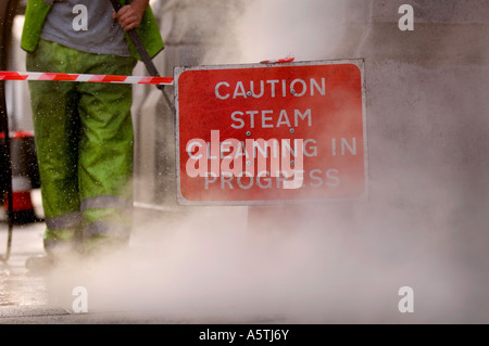 Gum removal from street by steam pressure. Picture by Jim Holden. Stock Photo