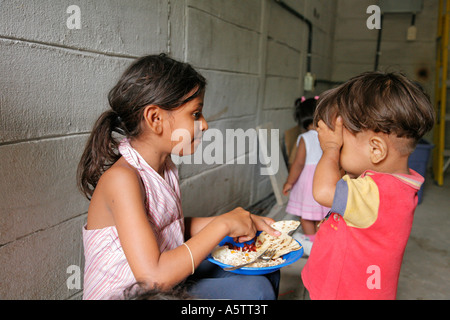 Painet jj1664 honduras children kids free feeding program slum barrio chamelecon san pedro sula latin america central Stock Photo