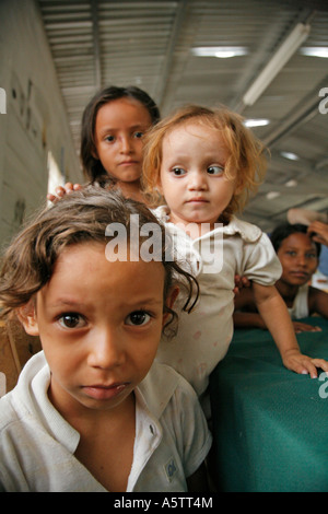 Painet jj1672 honduras children kids girls free feeding program slum barrio chamelecon san pedro sula latin america central Stock Photo
