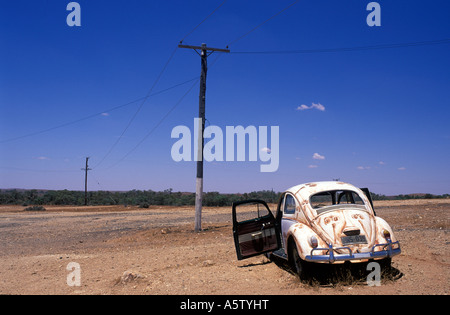 Abandoned Volkswagen beetles used as advertising for a gallery in the ...