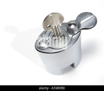 A chrome strong tough padlock and key Stock Photo