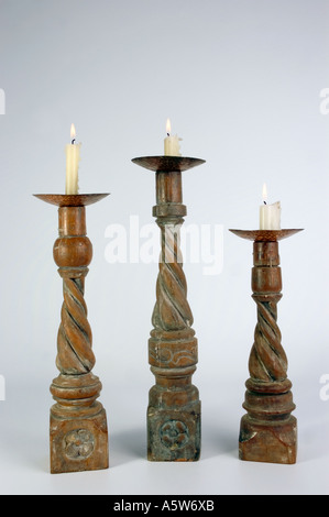 Three Wooden barley twist candle sticks with candles. DSC 8622 Stock Photo