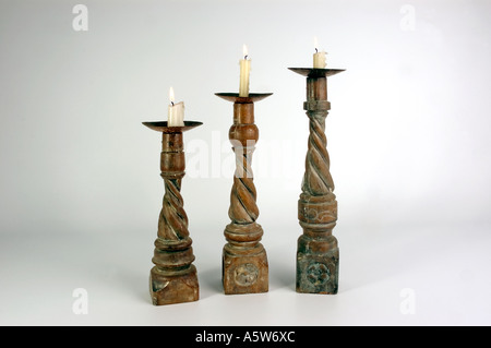 Three Wooden barley twist candle sticks with candles. DSC 8626 Stock Photo
