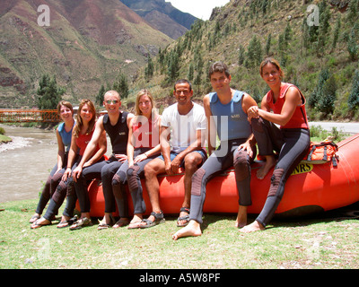 Group of young people on a white water rafting experience in Peru Stock Photo
