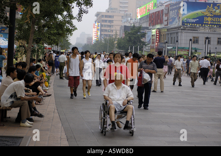 People walking around Wangfujing Street / Mall and Wangfujing night market, Beijing, China. Stock Photo