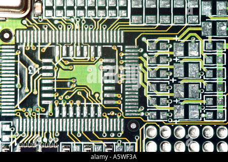 A close-up of the electrical circuitry on a computer graphics card. Stock Photo