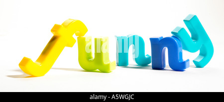 the word funny spelt out with colourful fridge magnets Stock Photo