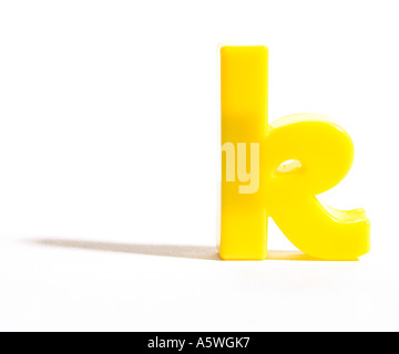 A yellow fridge magnet letter K Stock Photo