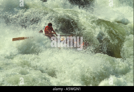 Shooting the Hole of Rapid No 5 on the Zambezi River, below Victoria Falls on the border between Zambia and Zimbabwe Africa Stock Photo