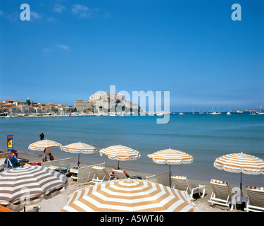 Beach looking towards Old Town, Calvi, Corsica, France Stock Photo