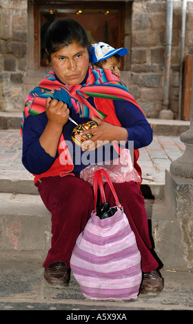 Street vendor with her child, Cusco, Peru, South America Stock Photo