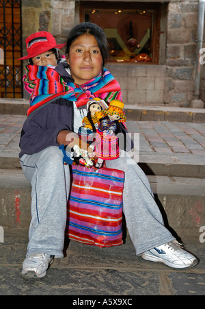 Street vendor with her child, Cusco, Peru, South America Stock Photo