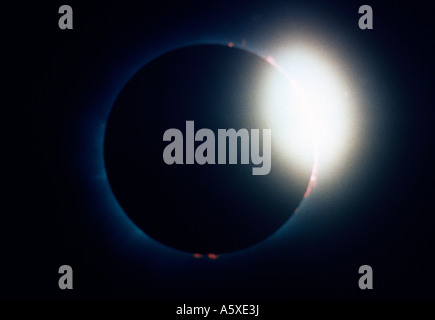 The Sun Begins To Show From Behind The Moon In A Solar Eclipse Creating A Diamond  Ring Stock Photo, Picture and Royalty Free Image. Image 85079890.