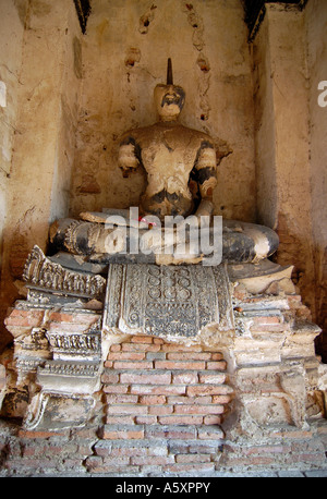 A headless Buddha statue in Wat Chai Wattanaram, in former royal capital city Ayutthaya, Thailand. Stock Photo