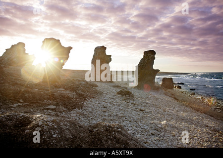 Sun backlit limestone (Rauk Stones ) a geological phenomenon in Langhammars Nature Reserve on stark coast of Gotland island. Stock Photo