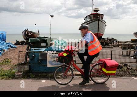 postman on bike Stock Photo