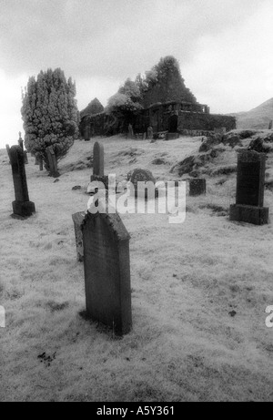 grave graveyard spooky ancient old ghost stone scary halloween spirit celtic cross Stock Photo