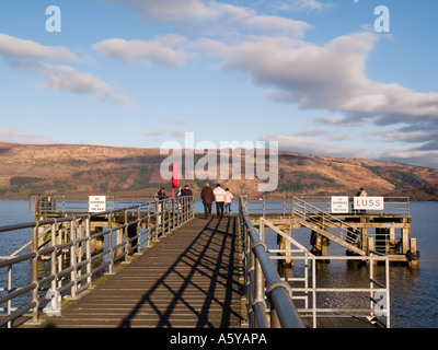 Luss pier and Loch Lomond in evening light in Loch Lomond and the Trossach National Park. Luss Argyll & Bute Scotland UK Britain Stock Photo