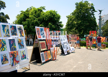 Art being sold in the park in front of the Recoleta Cemetery in Buenos Aires, Argentina. Stock Photo