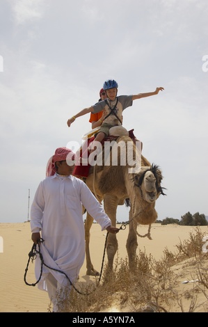 hippo therapy with camel / camel riding Stock Photo