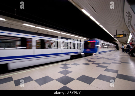 Madrid metro underground tube network train coming into station Stock Photo