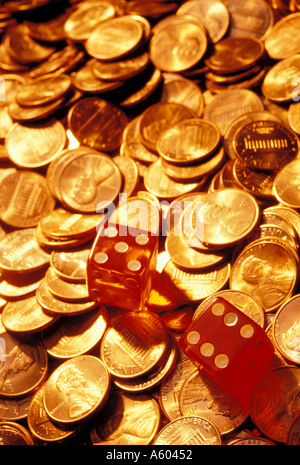 Pair of dice on pennies Stock Photo