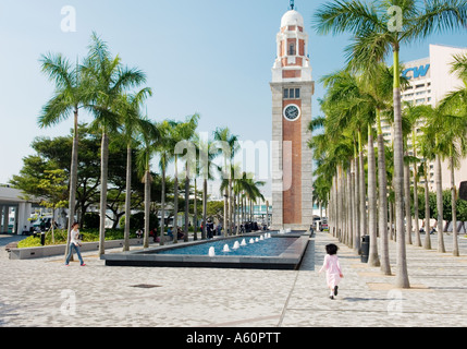 Hong Kong, China. The Old Clock Tower colonial remnant on the Tsim Sha Tsui waterfront promenade end of Nathan Road, Kowloon Stock Photo