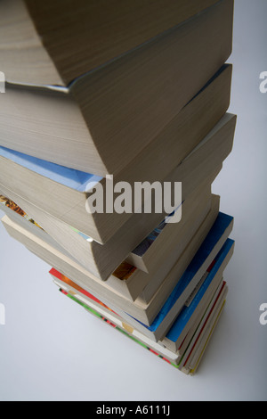 looking down at a tall stack of paperback books Stock Photo - Alamy