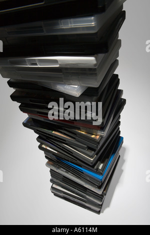 tall stack of dvd cases looking down, side view of a tall stack of dvd ...
