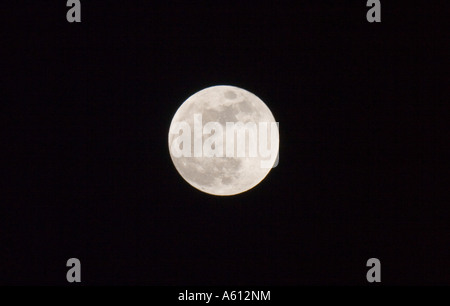 Full moon against a black night sky Stock Photo