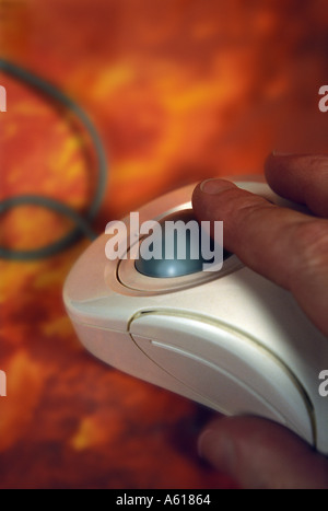 hand on computer mouse Stock Photo