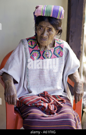 GUATEMALA ACAL Elderly indigenous Mam Mayan woman in traditional dress of huipil corte and tzute Stock Photo