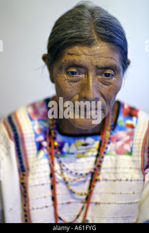 GUATEMALA ACAL Elderly indigenous Mam Mayan woman in traditional dress of hand woven and embroidered huipil Stock Photo