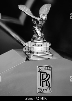Black and white monochrome shot of a classic Rolls Royce hood ornament emblem sliver lady spirit of ecstacy Stock Photo