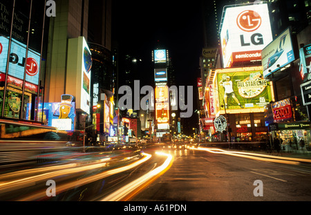 The beauty color and energy of famous Times Square at night with streaks of traffic in New York City USA Stock Photo