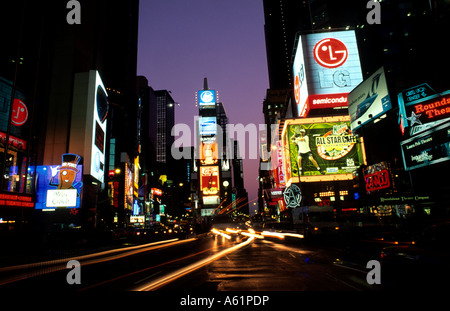 The beauty color and energy of famous Times Square at night with streaks of traffic in New York City USA Stock Photo