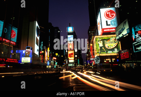 The beauty color and energy of famous Times Square at night with streaks of traffic in New York City USA Stock Photo