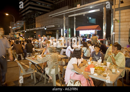 Outdoor dining at Lau Pa Sat festival market hawker centre, Chinatown, Singapore Stock Photo