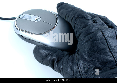 Hand in glove on computer mouse  Stock Photo