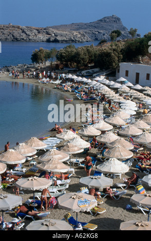 Tourists on beach, Lidos Beach, Rhodes, Greece Stock Photo
