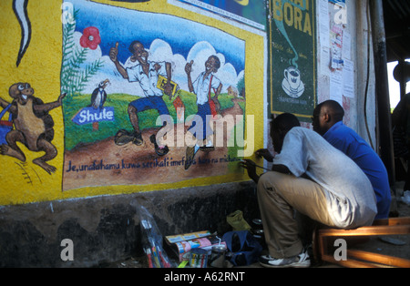 Advertising painters at work Mwanza Lake Victoria Tanzania Stock Photo