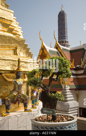 Statues and foliage at The Grand Palace Bangkok or Royal Palace Thailand Stock Photo