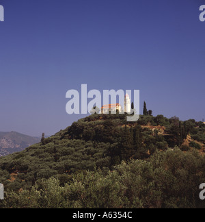 Ano Gerakari Church on wooded hilltop with deep blue sky background central Zakynthos Island The Greek Islands Stock Photo