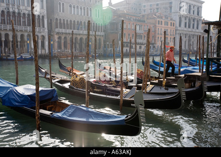 Gondolas moored on the Grande Canal in Venice Italy in February Stock Photo