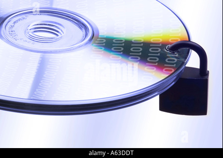 Concept data security, single DVD with padlock on white baclground Stock Photo