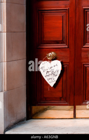 Hanging on a door knob - Valentine's Day wishes Stock Photo